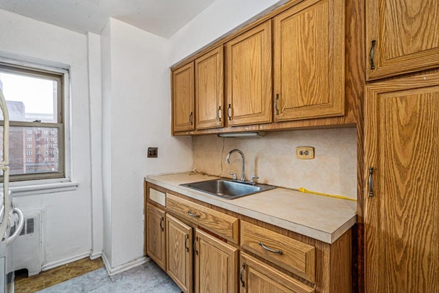 kitchen with sink and backsplash