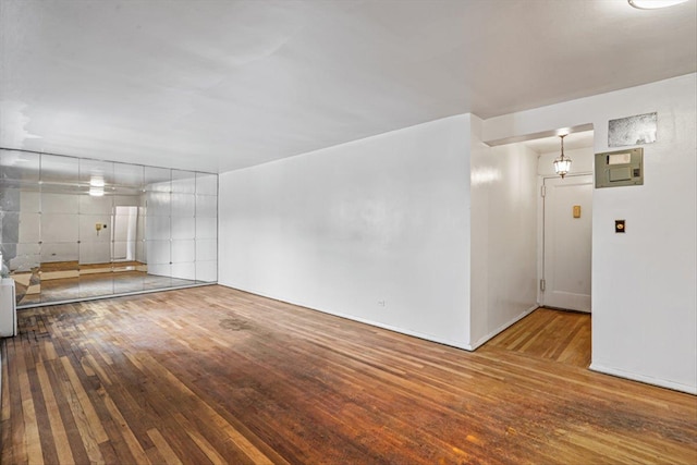 spare room featuring hardwood / wood-style floors