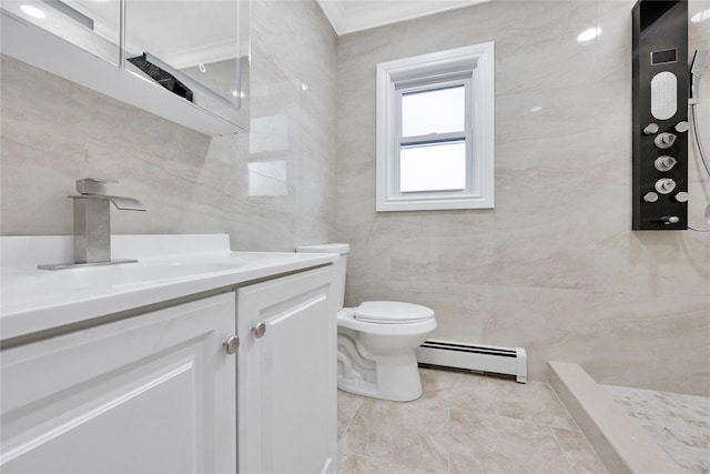 bathroom featuring toilet, tile walls, ornamental molding, vanity, and a baseboard heating unit