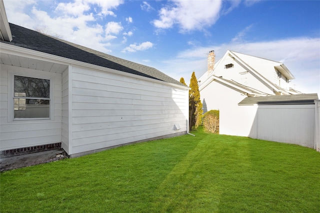 view of home's exterior featuring a lawn