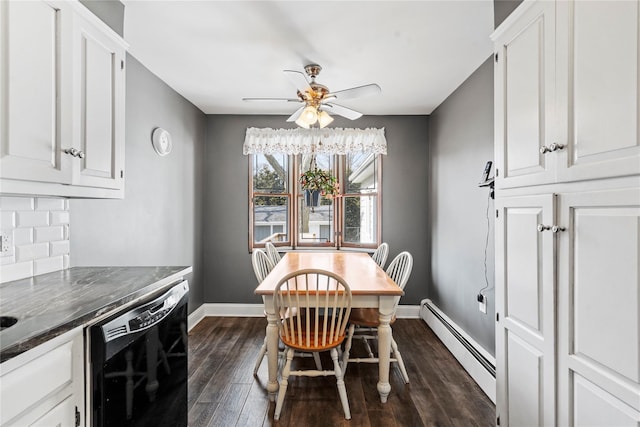 dining room with ceiling fan, a baseboard radiator, dark wood finished floors, and baseboards