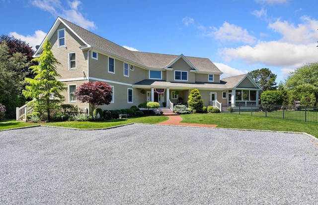 view of front of home with a front yard