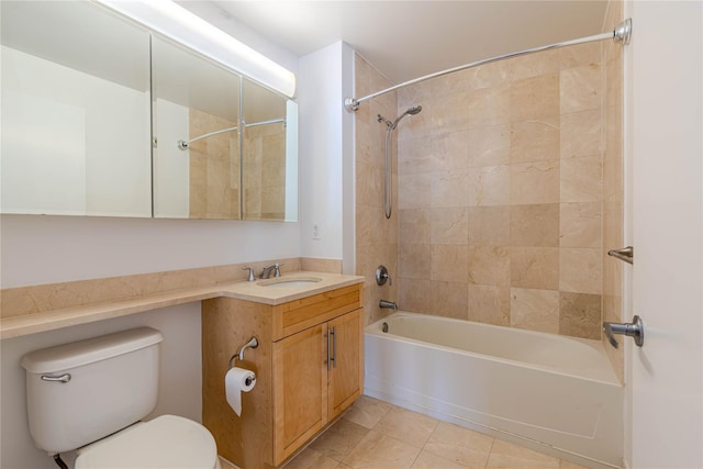 full bathroom with tiled shower / bath, vanity, tile patterned floors, and toilet