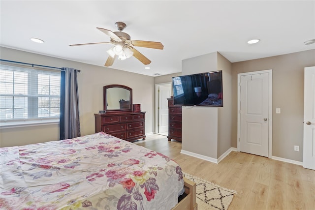 bedroom with light wood-style floors, baseboards, a ceiling fan, and recessed lighting