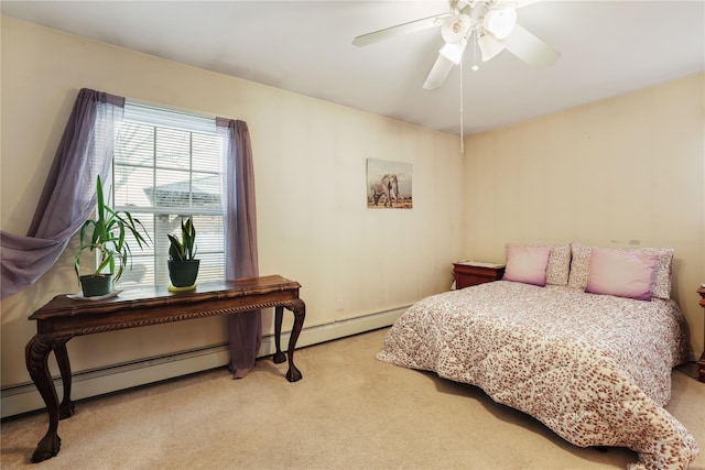 bedroom with ceiling fan and light colored carpet