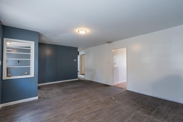 34 Laurel Trl, Monroe, NY 10950 - spare room with wood finished floors, baseboards, visible vents, and built in features