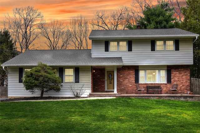 8 Lucky Ln, Washingtonville, NY 10992 - view of front of property featuring brick siding, a shingled roof, and a chimney