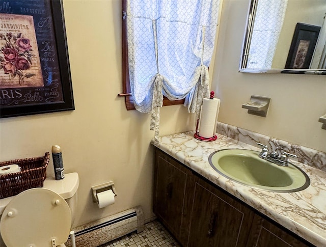 8 Lucky Ln, Washingtonville, NY 10992 - bathroom featuring baseboard heating, toilet, and vanity