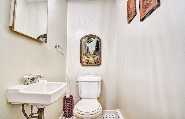 8 Lucky Ln, Washingtonville, NY 10992 - bathroom featuring toilet, a sink, and baseboards