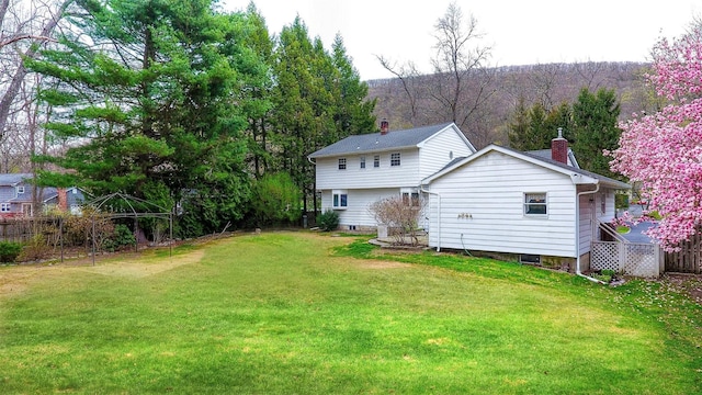 8 Lucky Ln, Washingtonville, NY 10992 - back of house with a chimney