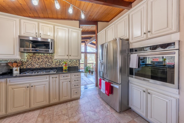 810 Haverstraw Rd, Suffern, NY 10901 - kitchen with beamed ceiling, dark countertops, wooden ceiling, and appliances with stainless steel finishes