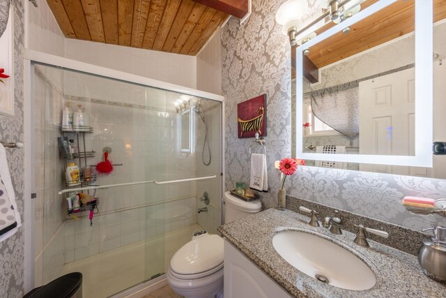 810 Haverstraw Rd, Suffern, NY 10901 - bathroom with wallpapered walls, toilet, and wood ceiling
