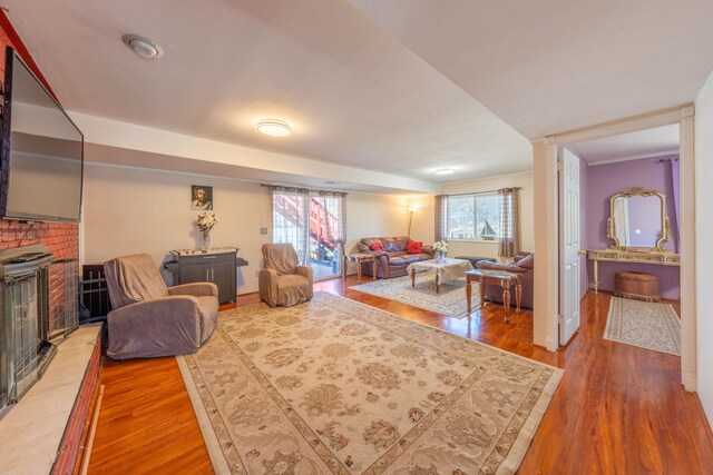 810 Haverstraw Rd, Suffern, NY 10901 - living area featuring wood finished floors and a fireplace