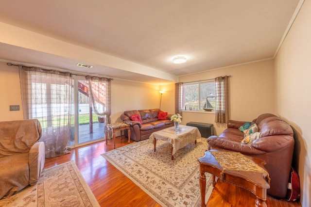 810 Haverstraw Rd, Suffern, NY 10901 - living room featuring crown molding, wood finished floors, and visible vents