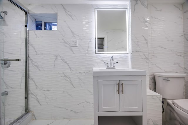 bathroom featuring vanity, tile walls, an enclosed shower, and toilet