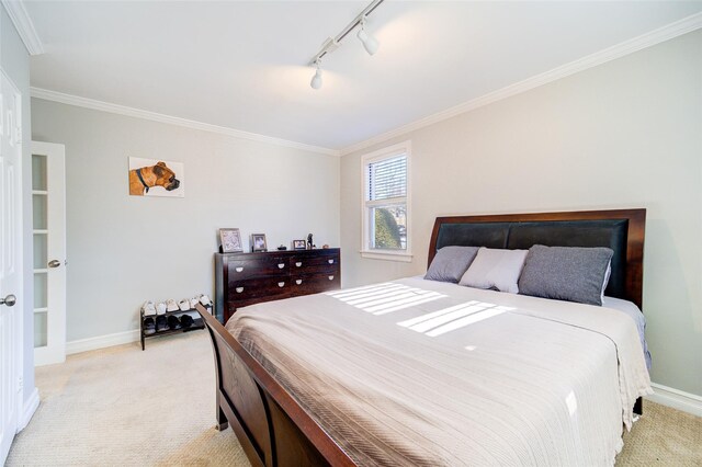 15 Bryant Cres Unit 1K, White Plains, NY 10605 - carpeted bedroom with track lighting and crown molding