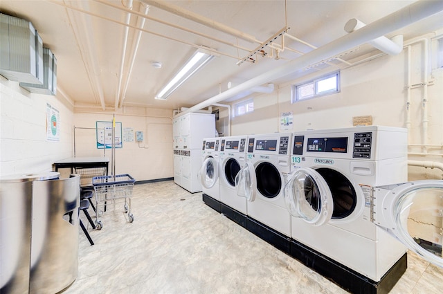 15 Bryant Cres Unit 1K, White Plains, NY 10605 - laundry room featuring stacked washer and dryer and separate washer and dryer