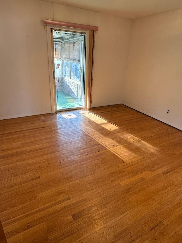 158-24 81st St, Howard Beach, NY 11414 - empty room featuring wood finished floors