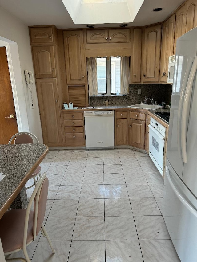 158-24 81st St, Howard Beach, NY 11414 - kitchen with dark countertops, tasteful backsplash, a sink, white appliances, and marble finish floor