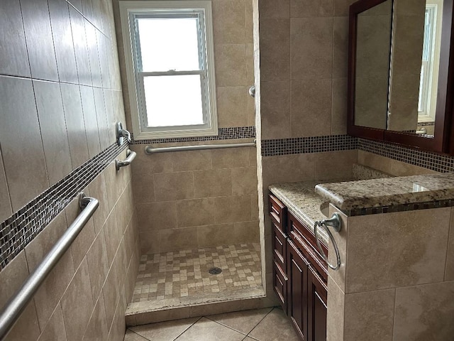 158-24 81st St, Howard Beach, NY 11414 - full bathroom featuring tile walls, tile patterned floors, and tiled shower