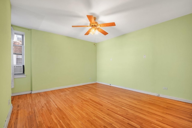 empty room featuring light hardwood / wood-style floors and ceiling fan