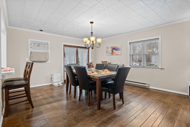 dining space with dark hardwood / wood-style flooring, crown molding, and a baseboard radiator