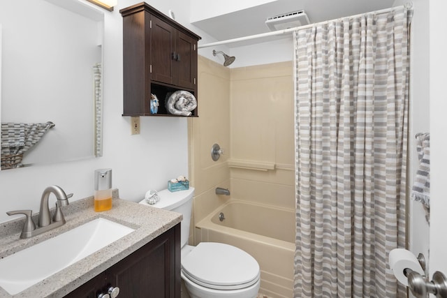 full bathroom featuring vanity, toilet, and shower / bath combo with shower curtain