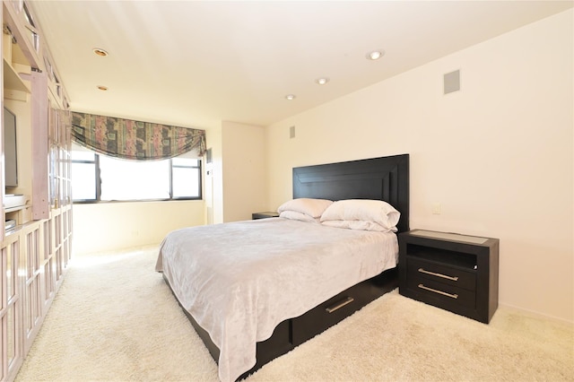 bedroom with recessed lighting and carpet