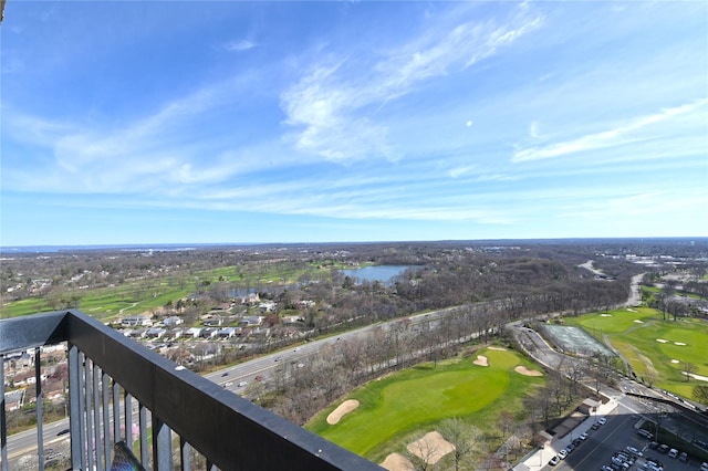 bird's eye view featuring view of golf course and a water view