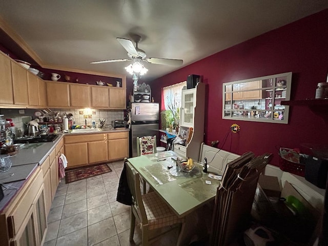 kitchen featuring stainless steel refrigerator, ceiling fan, tasteful backsplash, light tile patterned flooring, and light brown cabinetry