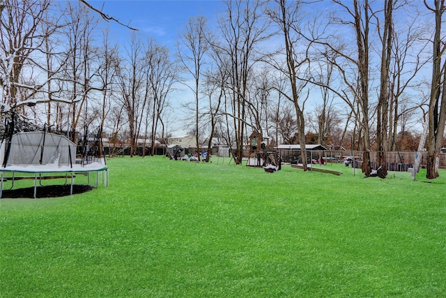 view of yard featuring a trampoline