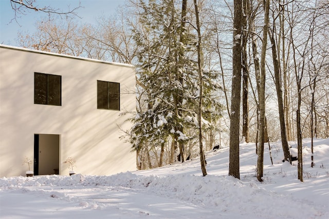 view of snow covered property