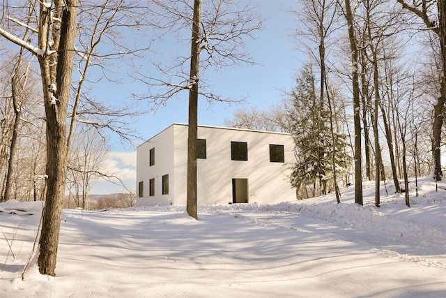 exterior space featuring stucco siding