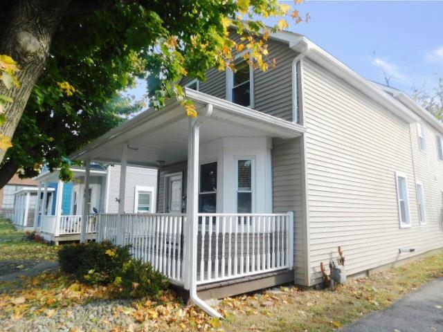 view of home's exterior with covered porch