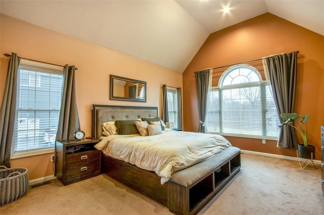 bedroom featuring vaulted ceiling, light colored carpet, visible vents, and baseboards