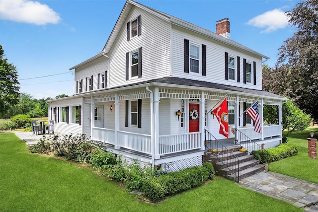 50 Maple Ave, Goshen, NY 10924 - farmhouse featuring covered porch, a chimney, and a front yard