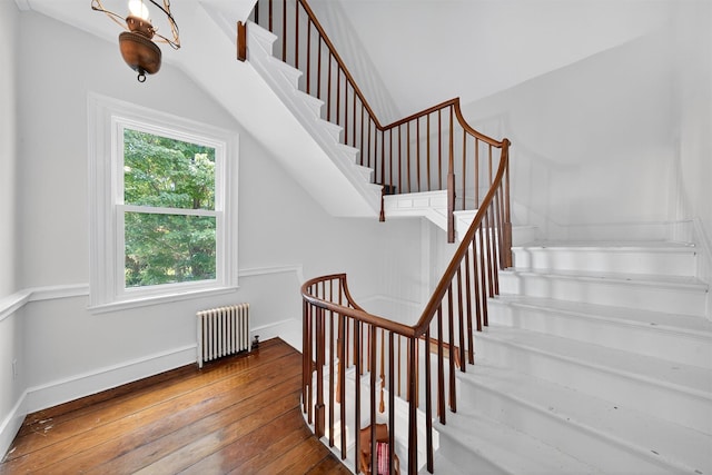 50 Maple Ave, Goshen, NY 10924 - stairs featuring radiator heating unit and hardwood / wood-style flooring