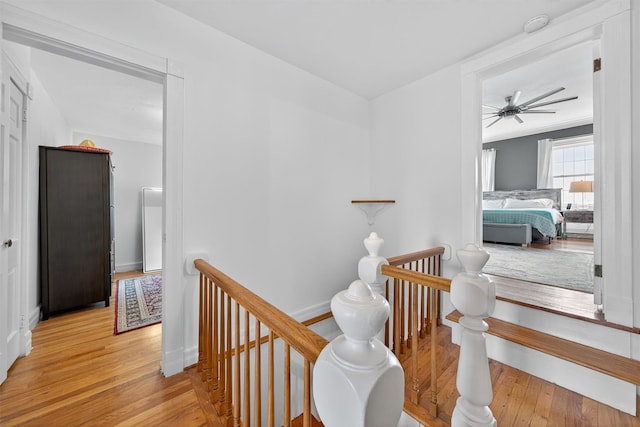 50 Maple Ave, Goshen, NY 10924 - hall featuring an upstairs landing and wood finished floors