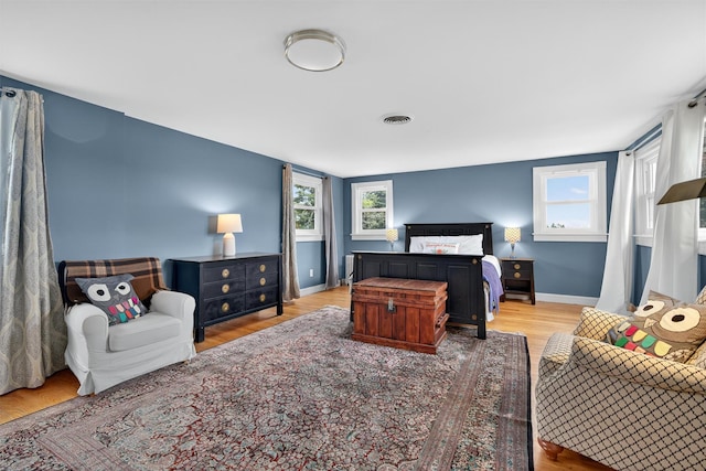 50 Maple Ave, Goshen, NY 10924 - bedroom featuring wood finished floors and multiple windows