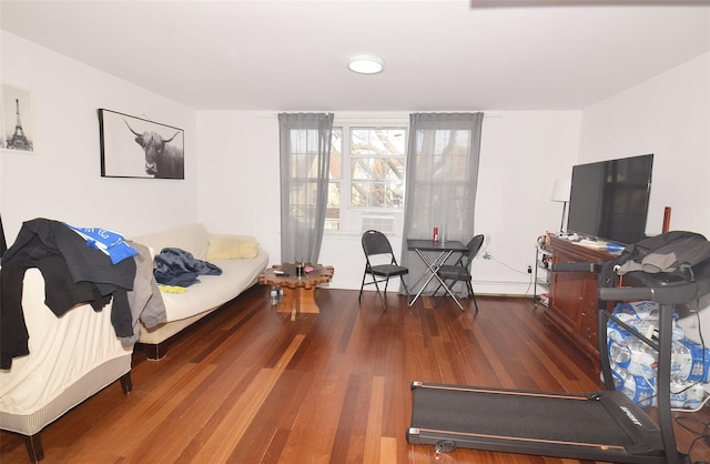 bedroom with dark wood-type flooring