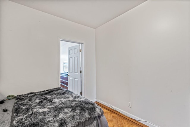 bedroom with parquet floors