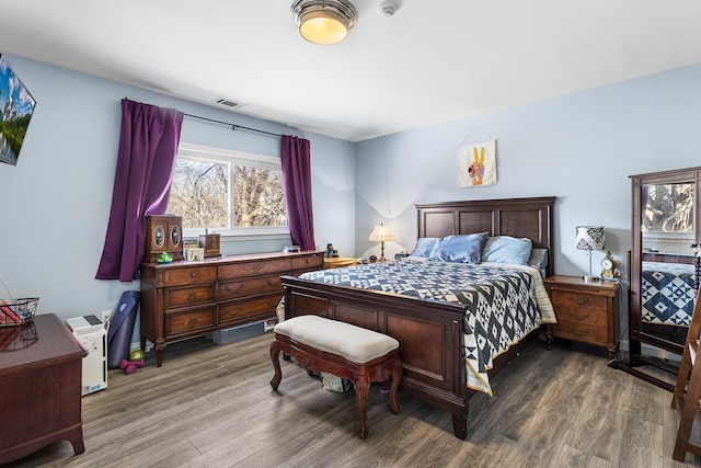 bedroom featuring hardwood / wood-style floors