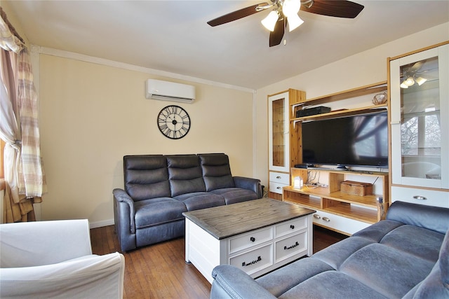 living area with ceiling fan, baseboards, dark wood finished floors, and a wall mounted air conditioner