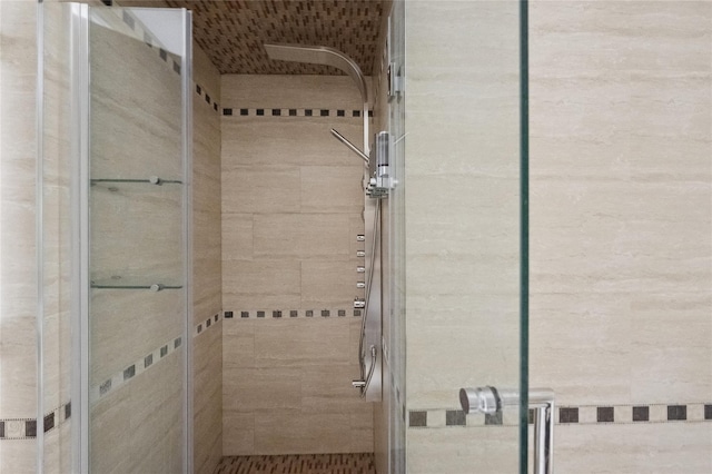 bathroom with a stall shower