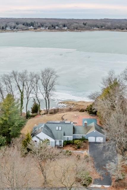 drone / aerial view with a water view