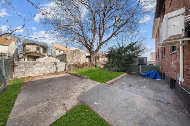 15815 77th Rd, Fresh Meadows, NY 11366 - view of yard featuring a residential view, fence private yard, and a patio