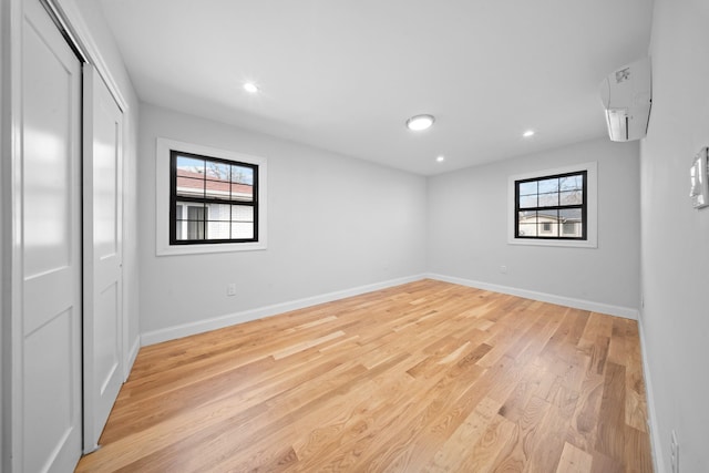15815 77th Rd, Fresh Meadows, NY 11366 - unfurnished bedroom with baseboards, a closet, light wood-style flooring, and recessed lighting