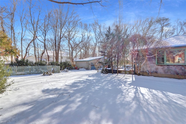 view of yard covered in snow