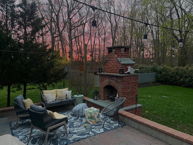 view of patio / terrace featuring an outdoor living space with a fireplace