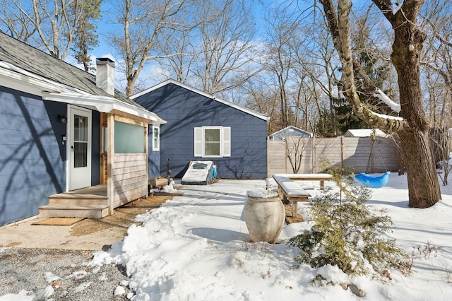 view of snow covered patio